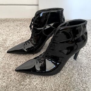 Patent leather pointed toe ankle boots